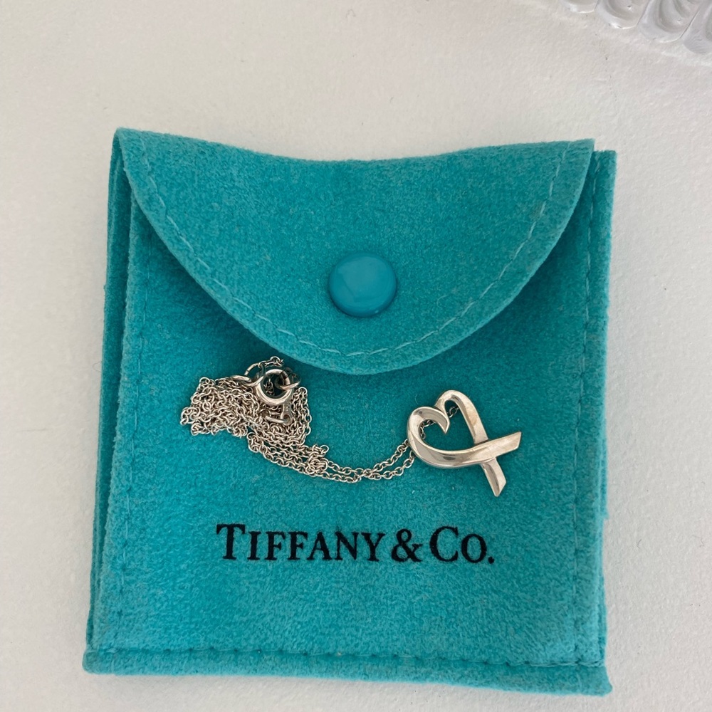 Tiffany & Co. Loving Heart Pendant. 17" Chain
Sterling Silver authentic